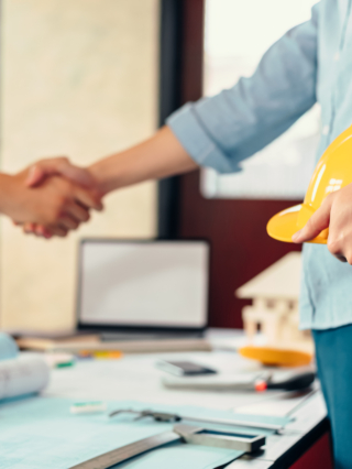 architect hold safety helmet. Blur architect, Engineer and businessman handshake after meeting together Background.
1757708441